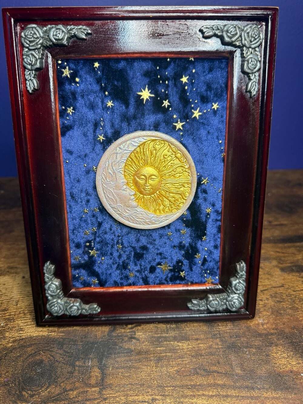 Handmade framed celestial focal on blue galaxy velvet.